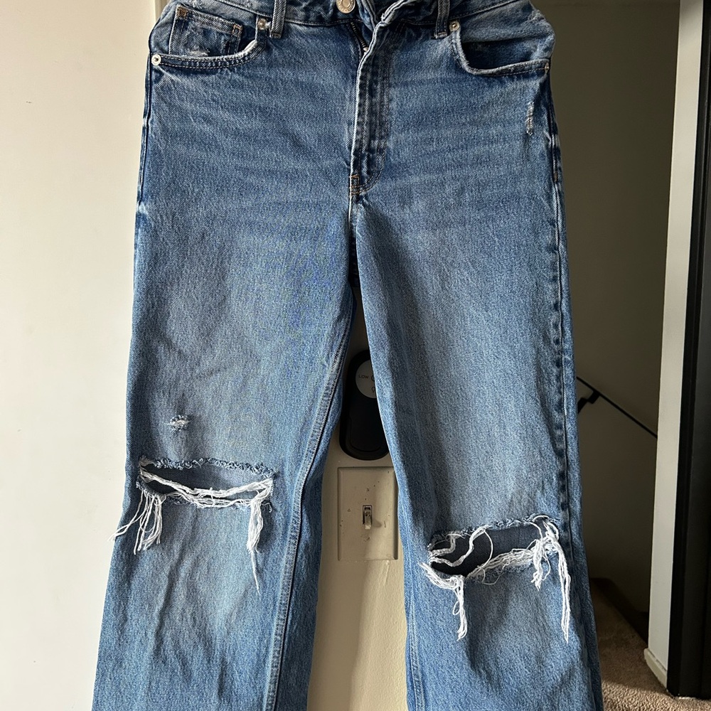 Distressed Blue Jeans